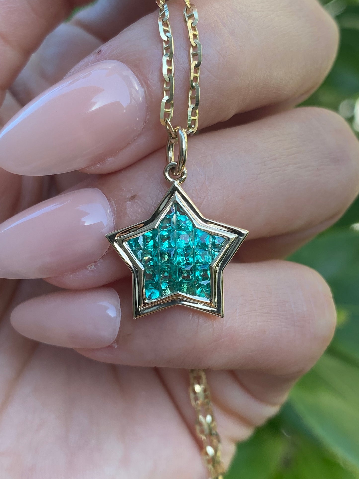 The WISH: 14k Gold Invisible Set Emerald Star Pendant
