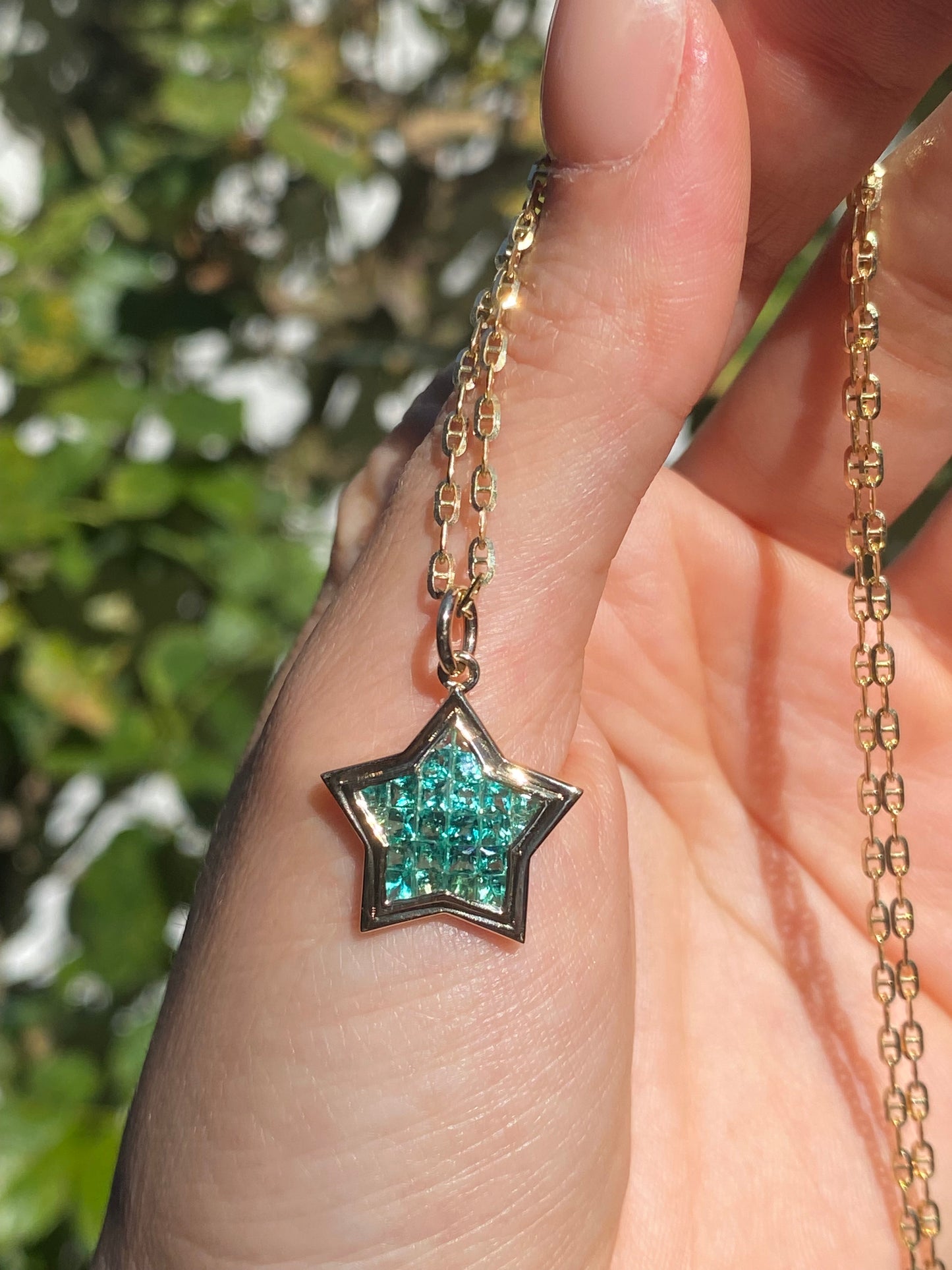 The WISH: 14k Gold Invisible Set Emerald Star Pendant