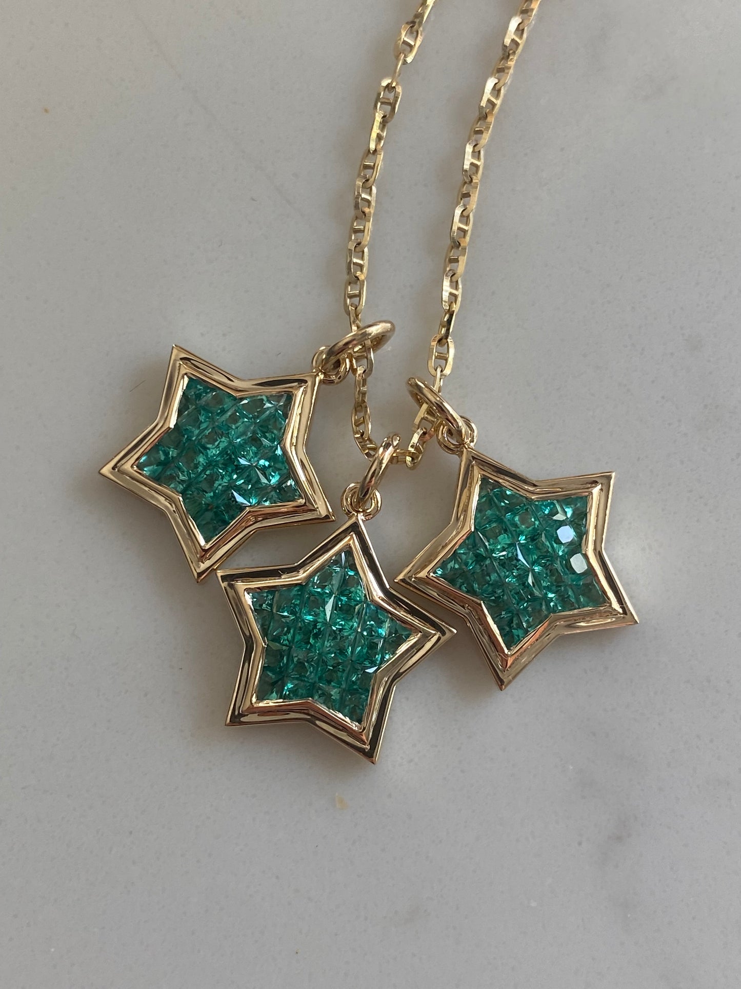 The WISH: 14k Gold Invisible Set Emerald Star Pendant